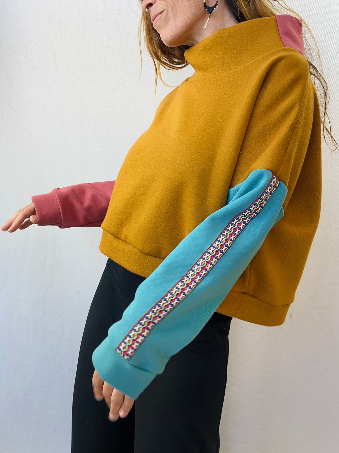 Jersey tierra y turquesa