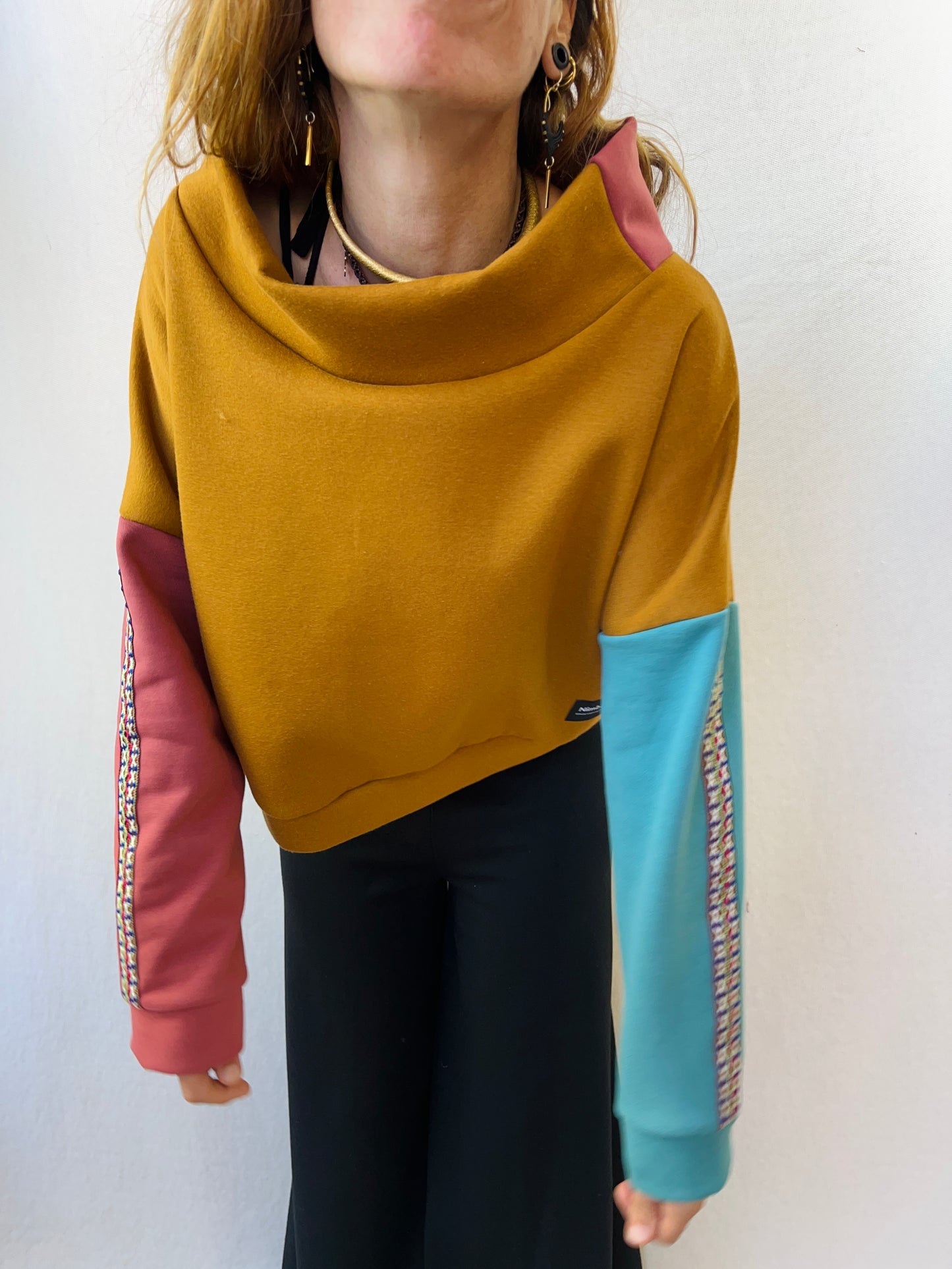 Jersey tierra y turquesa